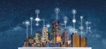 Smart city, building technology, and real estate business. Businessman holding digital tablet with buildings hologram and application programming interface technology