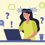 A woman working at a laptop appears bamboozled by regulation