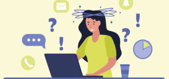 A woman working at a laptop appears bamboozled by regulation