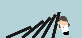 Illustration of a businesswoman fighting back against an economic downturn.